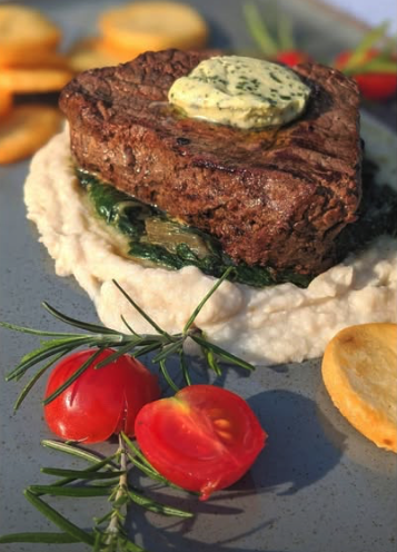 Dry-aged steak with herb butter at Restaurant Radobolja